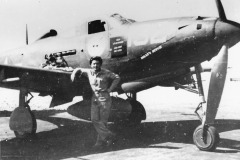 Captain William "OBee" OBrien, Ace with 6 victories, Original 363rd FS member. With his P-39 "Billy's Bitch"