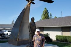 Bud with his statue at the Auburn, CA, Airport next to Wings Café