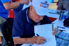 Bud signing books and posters at the Reno Air Races 2019
