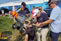 Bud signing an Old Crow Pedal Plane, Oshkosh 2019
