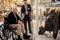 Bud looking at his WWII flight jacket and helmet on display with the Steven F. Udvar-Hazy Center   with  Curator Dr. Jeremy Kinney, The Jacket and Helmet will move to the National Air and Space Museum when their new WWII Exhibit opens.