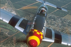 Bud flying P-51D Old Crow. Earl Smith photo