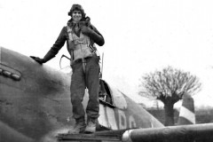 Bud on the wing of an early P-51B