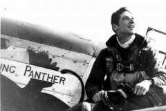Captain Eddie Simpson sitting on his P-51B "Flying Panther"