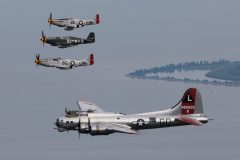Beautiful formation shot P-51s with B-17 Photo Paul Bowen