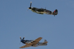 Bud and Rob flying Lady Jo with a replica Spitfire over Falcon Field, AZ