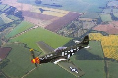 Bud flies the Scandinavian Historic Flight P-51D Old Crow over Leiston Airfield 2001