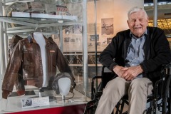 WWII fighter pilot Col Bud Anderson with his family visits Steven F. Udvar-Hazy Center in Chantilly, VA, April 24, 2019. The ace pilot came to view his donated WWII flight jacket and helmet that is now on display in the museum. Curator Jeremy Kinney escorted Anderson and his guests on a tour of the WWII area and into the Mary Baker Engen Restoration Hanger to view some of the aircraft and meet some of the of the conservation team and restoration team. (Smithsonian photo by Jim Preston)[20190424JP 0072]